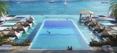 an all inclusive luxury resort just opened in curacao and it has a two level infinity pool