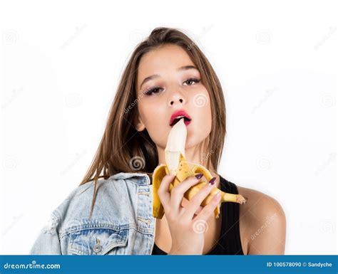 Young Sensual Woman Eating Banana On White Background Provocation