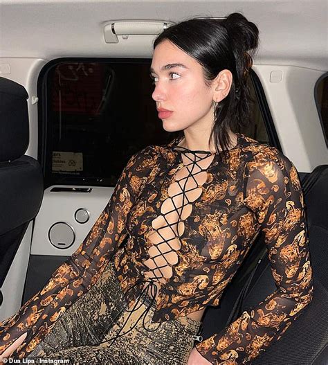 Dua Lipa Turns Up The Heat As She Flaunts Her Cleavage In A Racy Tie Up Top And
