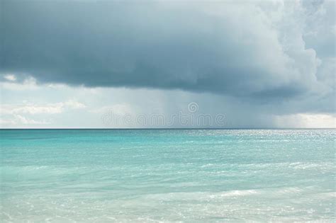 Caribbean Beaches And Ocean Caribbean Sea Dark Sky Rain Stock Photo