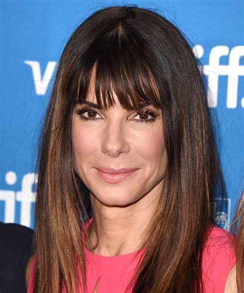 Nothing enhances a layered haircut quite like a contrasting color, and this lavender shade really makes a statement against a darker base. The Best Celebrity Bangs | InStyle.com