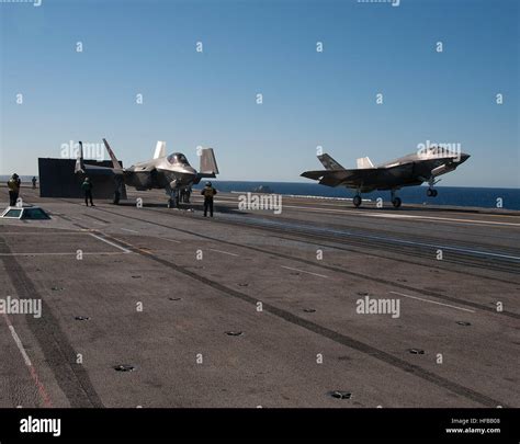 Two F 35c Lightning Ii Carrier Variant Joint Strike Fighters Conduct