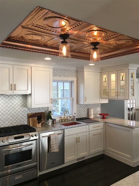 For more kitchen lighting ideas, follow our favorites on. Copper ceiling. Schrock Denton shaker cabinets. Copper ...