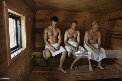 Three Men Sitting In Sauna With Heads Bowed Photo Getty Images