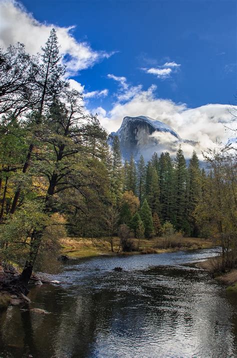 Half Dome In The Clouds And The Merced River Yosemite National Park