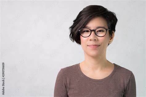 Studio Portrait Of A Beautiful Middle Aged Asian Woman Model 40 50