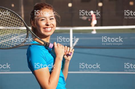Pretty Teenage Tennis Player Holding A Racket And Playing A Match Partido De Tenis