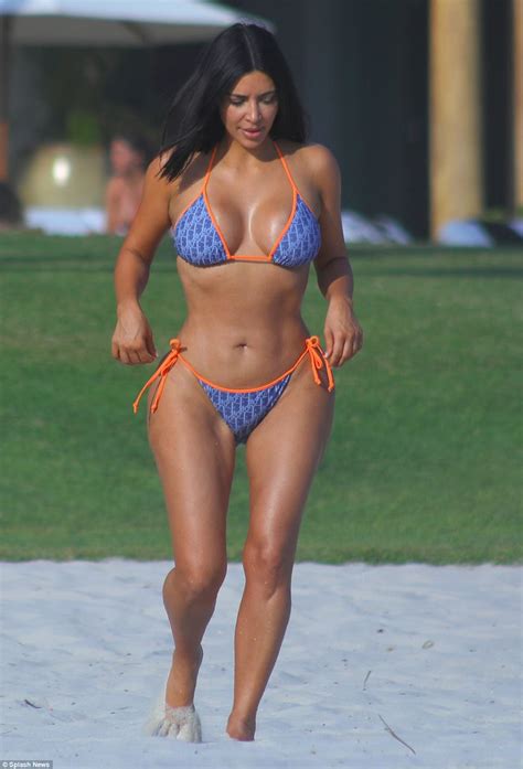 Kim Kardashian Tries On Another Bikini After Photo Frenzy Daily Mail Online