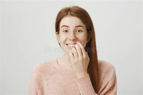 Close Up Portrait Of Funny Emotive Caucasian Ginger Girl With Bad Habit