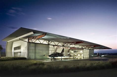 Material Efficient Plane Hangar And Museum Takes Inspiration From A Wing