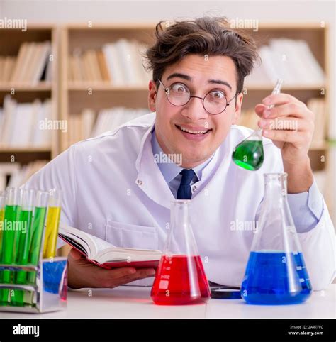The Mad Crazy Scientist Doctor Doing Experiments In A Laboratory Stock
