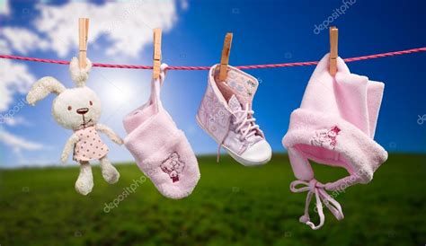 Baby Clothes On The Clothesline In Outdoor Stock Photo By ©geribody