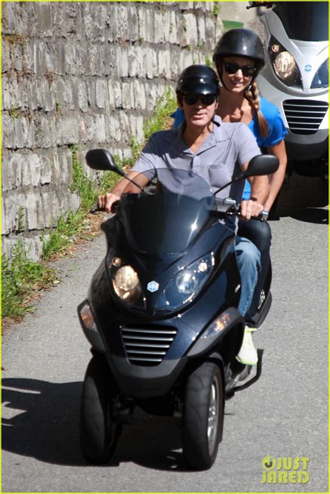 George Clooney And Stacy Keibler Switzerland Scooter Ride Photo