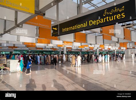 Travelers At International Departure Area Of Islamabad International