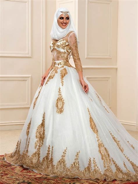 This Luxurious Muslim Wedding Gown With Gold Sequins And Long Sleeves Has A Full Skirt And Would