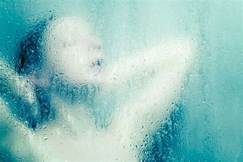 Premium Photo Beautiful Woman In The Shower Behind Glass With Drops