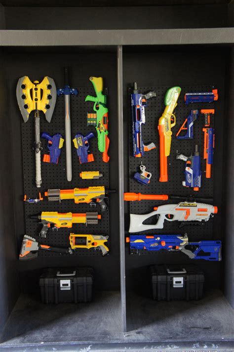 Love this idea for a simple storage solution. Nerf arsenal setup we just created from peg boards. Every ...