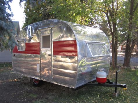 There are signs of wear. 1953 Tour It Canned Ham | Vintage camper, Vintage campers ...