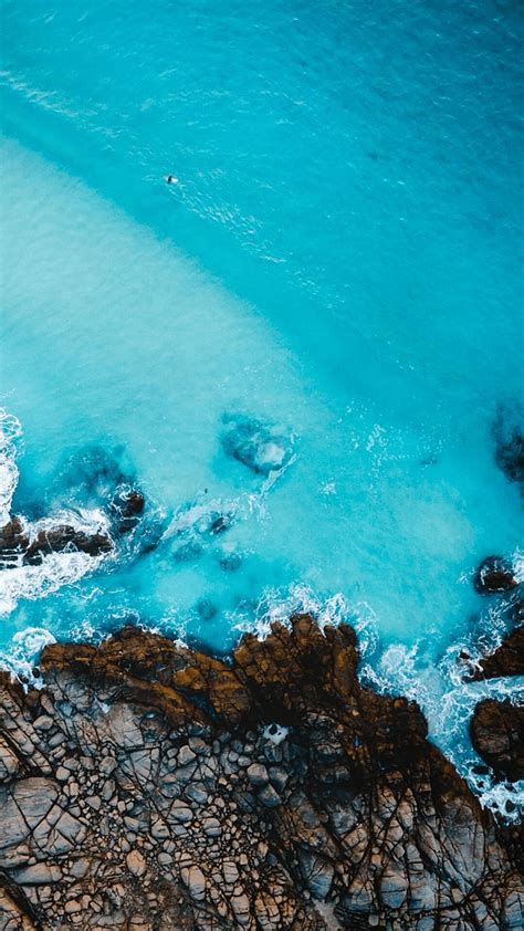 Aerial View Of Beach Rocks Iphone Wallpaper Iphone Wallpapers