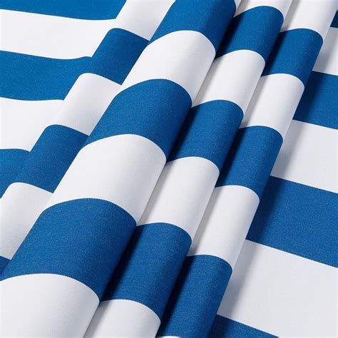 A White And Cobalt Blue Wide Striped Outdoor Fabric From The Sunbrella