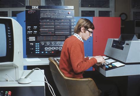 A Man Sits At An Ibm System370 Mainframe Computer In This 1970 Photo