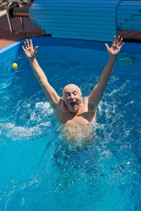Mature Active Man Getting A Workout At The Swimming Pool Stock Image