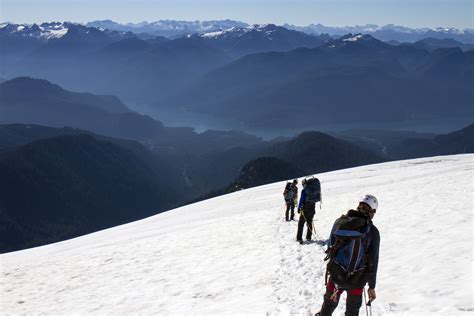 Hiking And Climbing In The Snow Landscape On Mount Baker