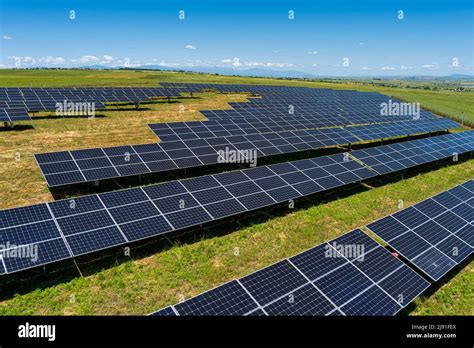 Aerial View Photovoltaic Panels Park On Green Field In North Greece