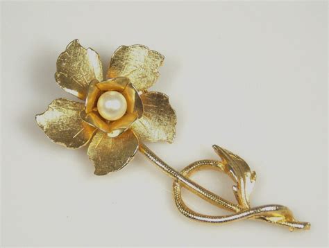 Vintage Gold Tone Flower Brooch Faux Pearl Center Thefashiondenblog