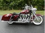 It has the typical engraving, beach bars, lowrider paint, and chrome for days. 2014 Harley-Davidson® FLHR Road King® (mysterious red ...