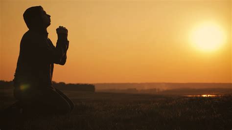 Silhouette Young Man Praying Outside At Beautiful Sunset Male Asks For