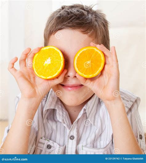 Child With Oranges Stock Photo Image Of Smile Cute 23129742