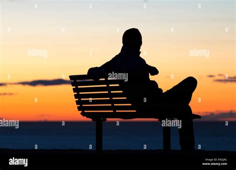 Depression Loneliness Concept Image Silhouette Of Man Sitting