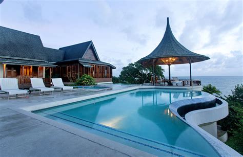 Swimming pool by luxury villa with a view on spinalonga island Ohana Villa has two infinity-edge swimming pools and a ...