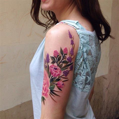 Excellent Violet And Pink Flowers Inked On The Left Upper Arm Tattoos