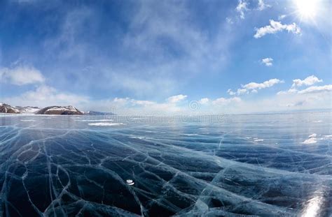 Winter Ice Landscape On Lake Baikal With Dramatic Weather Clouds Stock