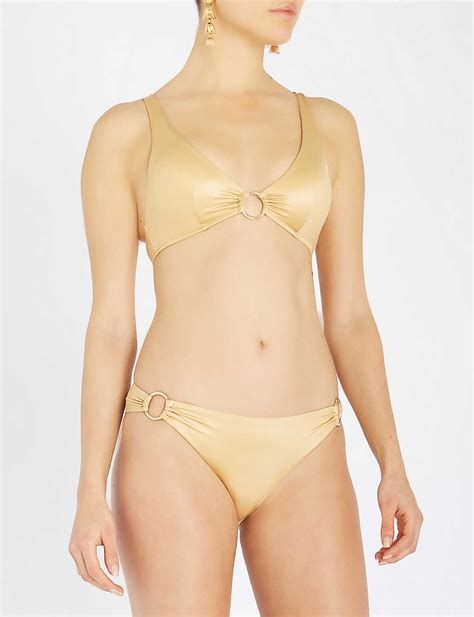Rita Ora Poses In A Skimpy Gold Bikini For Series Of Sizzling Snaps During Getaway To Ibiza