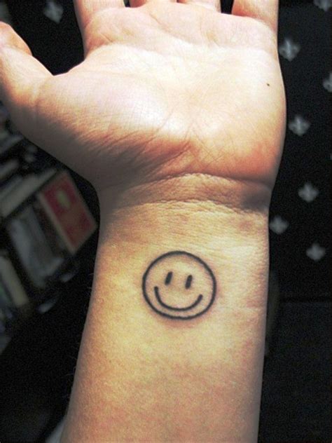 24 Great Smile Tattoos For Wrist Wrist Tattoo Designs