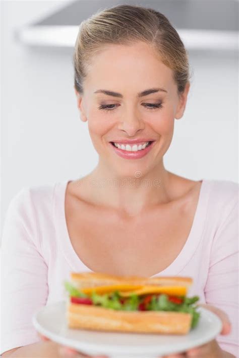 cheerful blonde with sandwich stock image image of household dieting 33052385