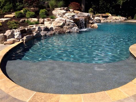 Their metals walls can oxidize and rust with today's technology, you can make the pool as deep and as curvy/straight/large as you'd like. Concrete "Gunite" Pools