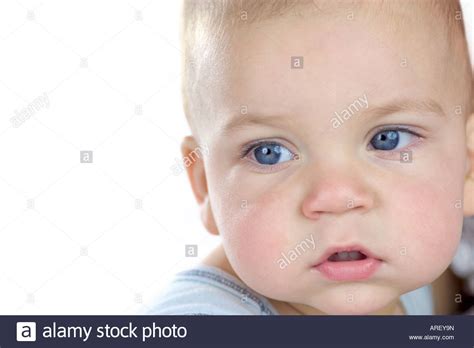 Close Up Portrait Of Sad Baby Isolated On White Stock Photo Alamy