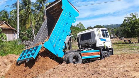 Hyundai Dump Truck Excavator Digging Dirt On Dump Truck Dump Truck