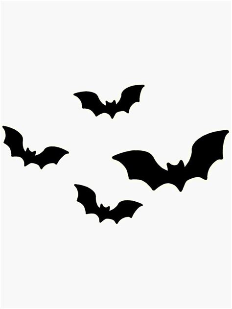 Three Bats Are Flying In The Sky