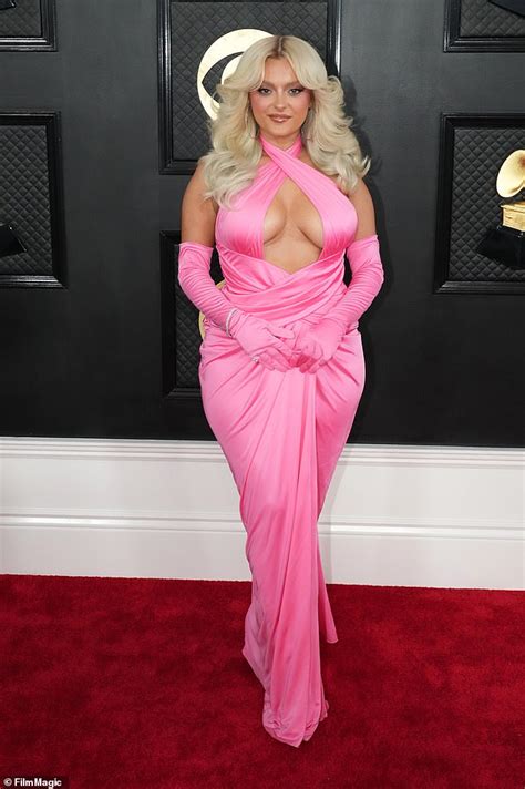 Bebe Rexha Puts On Busty Display In Low Cut Pink Gown And Matching Gloves Heading Into Th