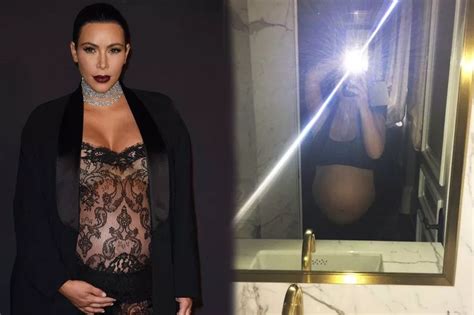 Kim Kardashian Shows Off Huge Bump In Her Underwear As She Waits To