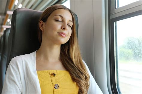 Premium Photo Tired Business Woman Sleeping Sitting In The Train After A Day Of Work Train
