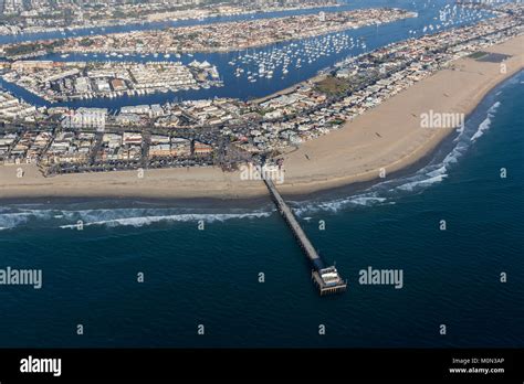 Aerial View Of Newport Beach Pier Homes Beach And Harbor In Orange