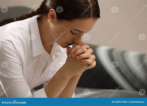 Religious Young Woman With Clasped Hands Praying Stock Photo Image Of