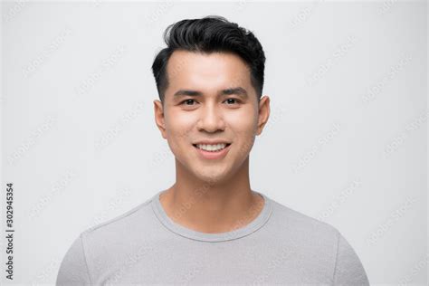 Young Asian Man Close Up Shot Isolated On White Stock Photo Adobe Stock