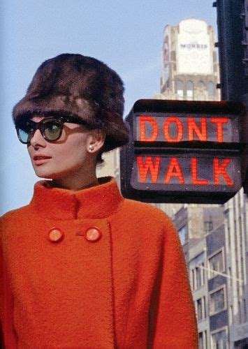 Audrey As Holly Golightly In Scene From Breakfast At Tiffanys Shes Wearing Orange Coat And